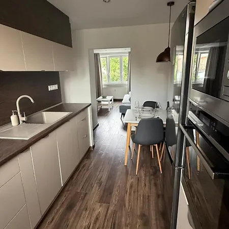 By The Fountain In The Center Of