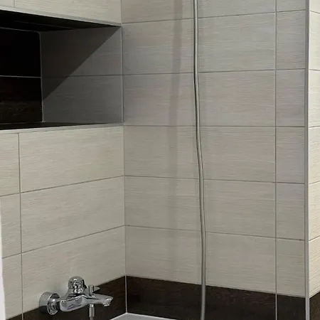 By The Fountain In The Center Of *