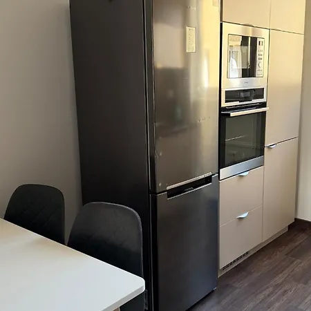 By The Fountain In The Center Of *